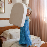Possum Play Tunnels & Shields in Babycino — young girl in a princess costume carrying a foam arch shield piece