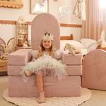 Possum Play Tunnels & Shields in Lilac — little girl in a princess dress sitting on a foam arch throne build