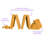 Possum Play Couch individual foam pieces laid out in Sunshine Yellow — 8 cushion modular play couch set
